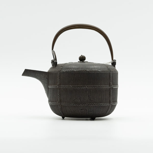 Chinese 19th-century ceremonial pot is crafted from patinated bronze and features exquisite design details