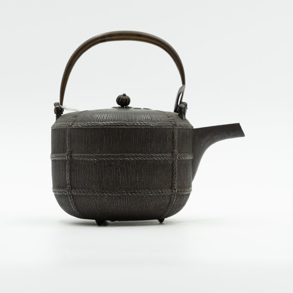 Chinese 19th-century ceremonial pot is crafted from patinated bronze and features exquisite design details