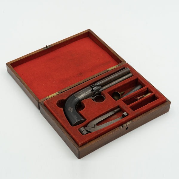 A Mariette Brevete  four barrel revolver and tools