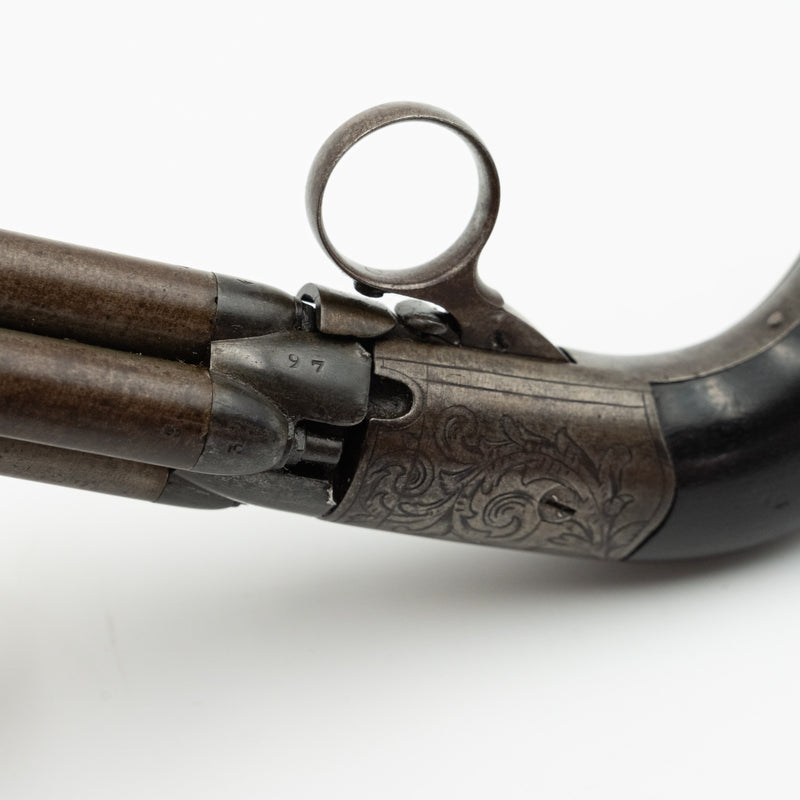 Un revólver de cuatro cañones Mariette Brevete y herramientas.