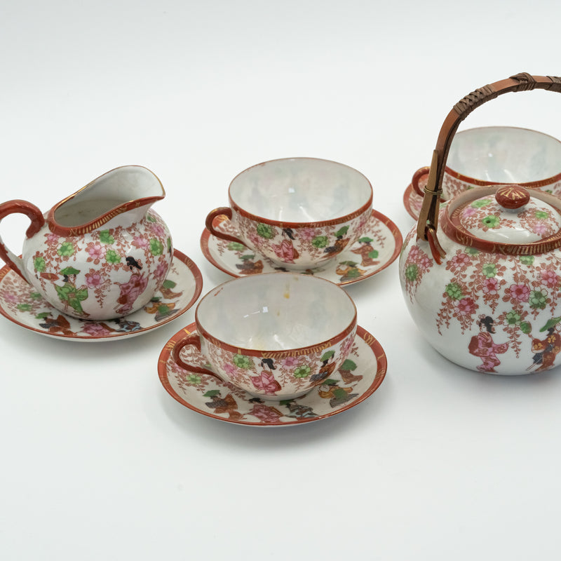 Antique Japanese fine porcelain tea set for 4 persons with hand-painted drawings of Geishas and Samurai