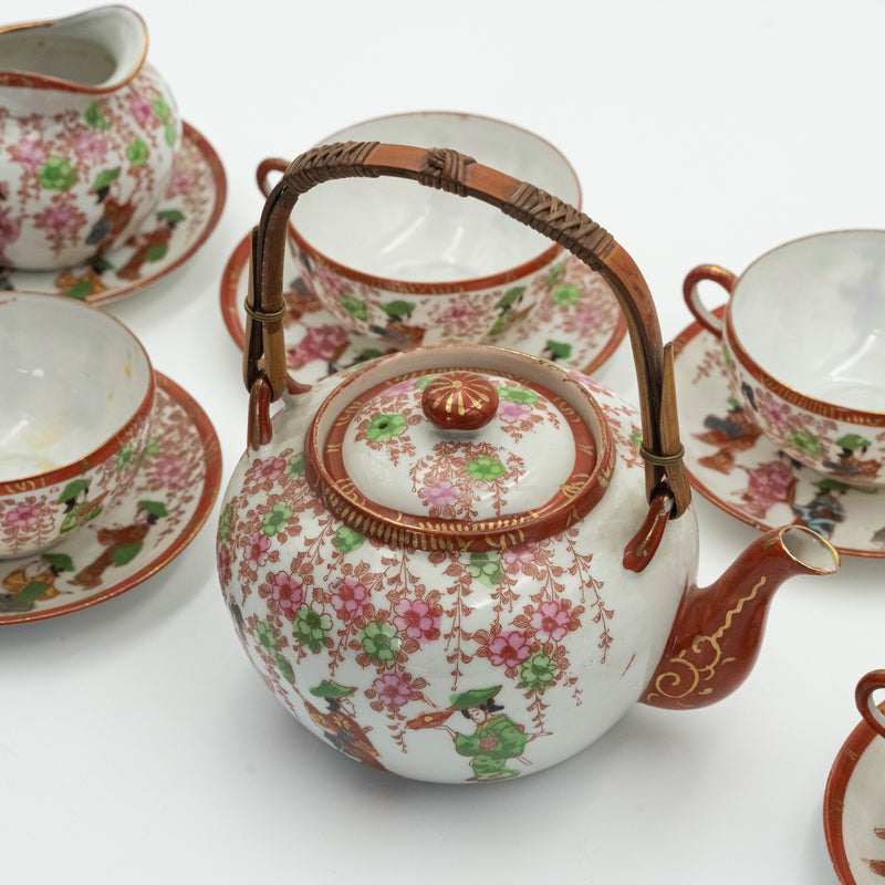 Antique Japanese fine porcelain tea set for 4 persons with hand-painted drawings of Geishas and Samurai