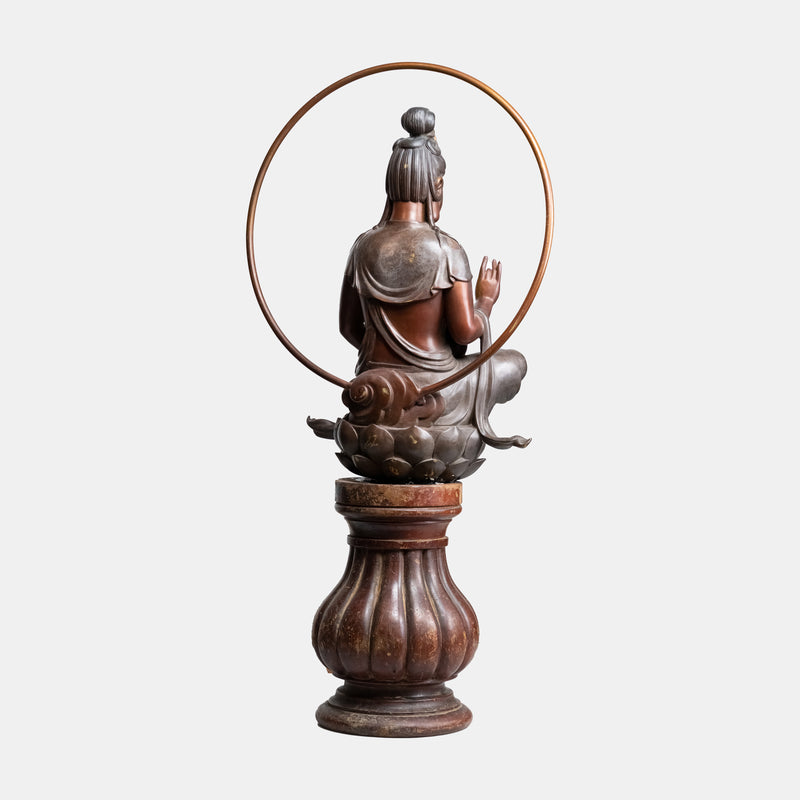 Antique bronze sculpture of the sitting Buddha in Shuni Mudra