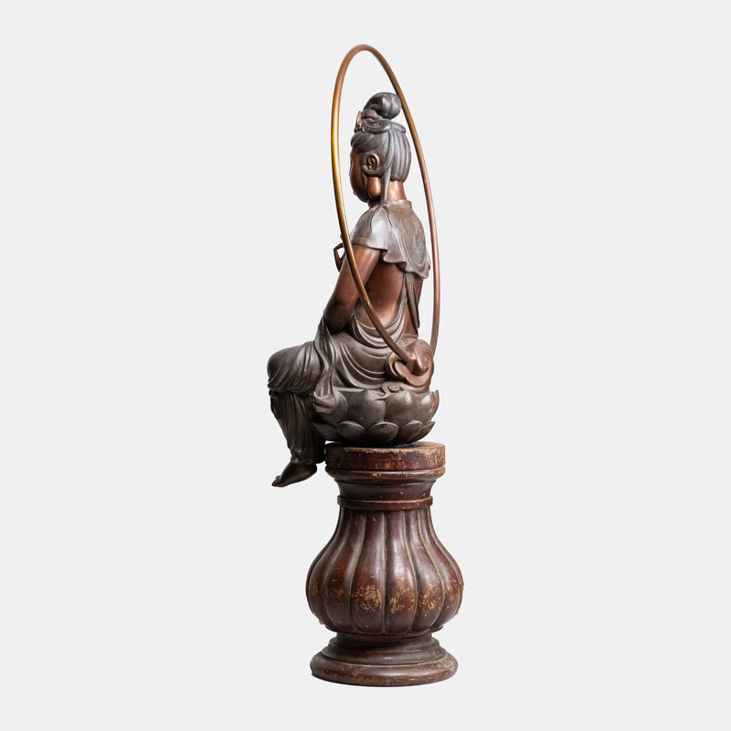 Antique bronze sculpture of the sitting Buddha in Shuni Mudra