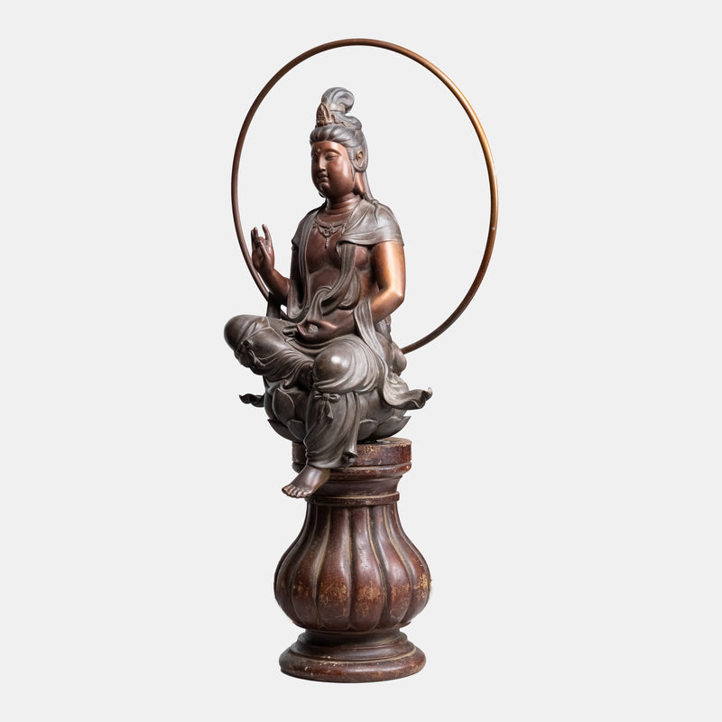 Antique bronze sculpture of the sitting Buddha in Shuni Mudra