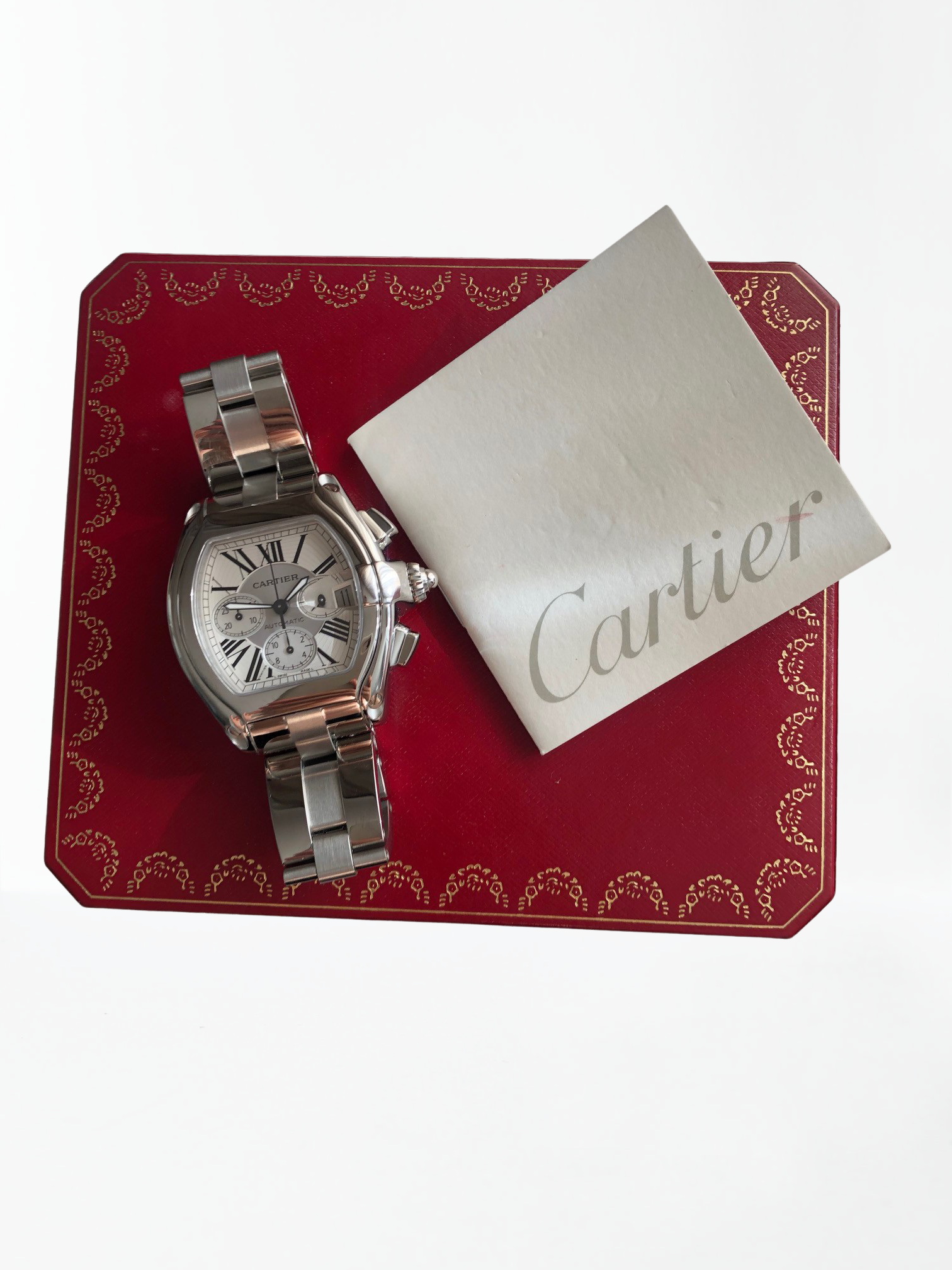 Pre-owned stainless steel Cartier Roadster Chronograph 2618 with a box