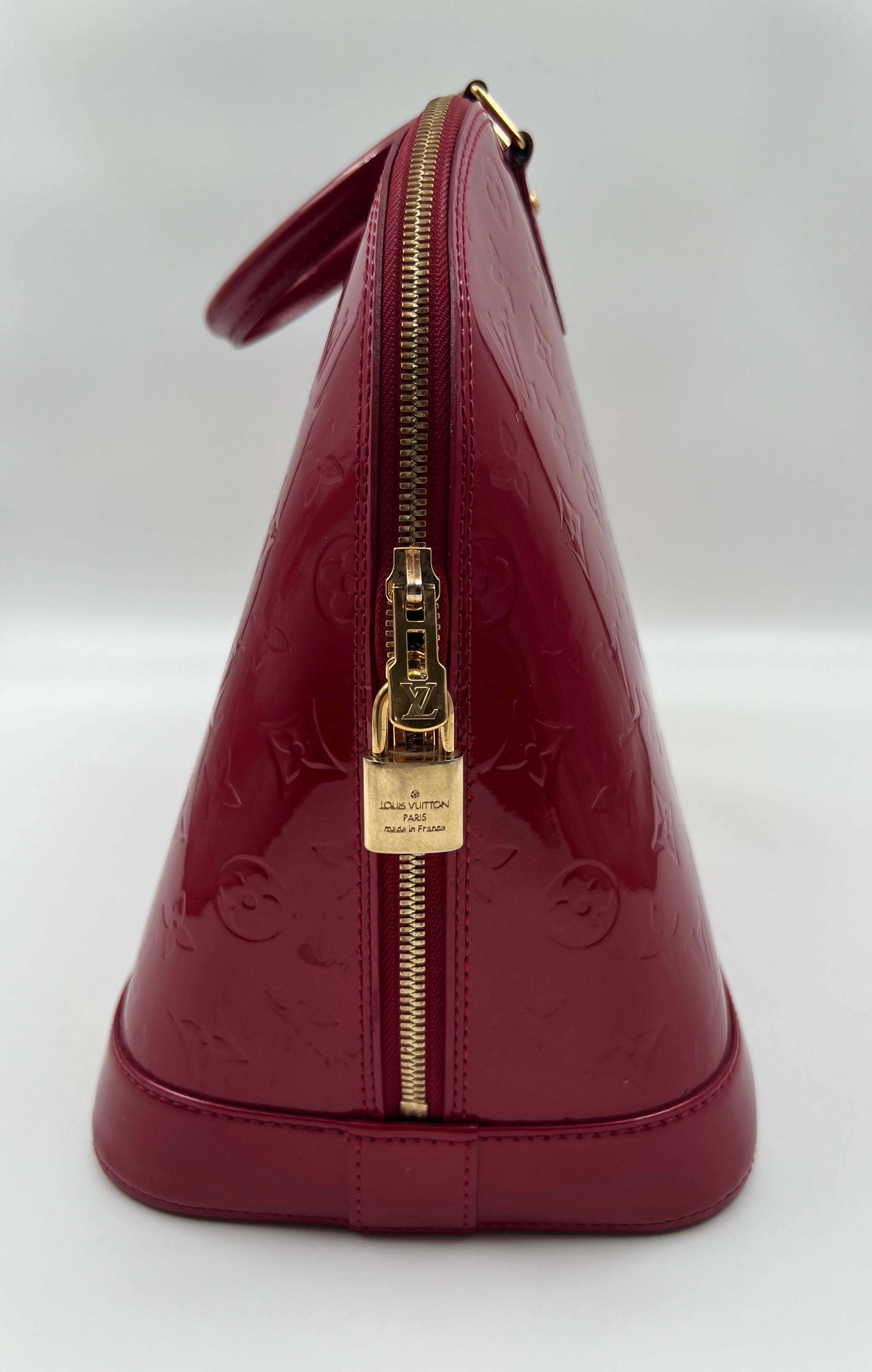Bolso de mano Louis Vuitton Monogram Vernis Alma MM de piel en color rojo