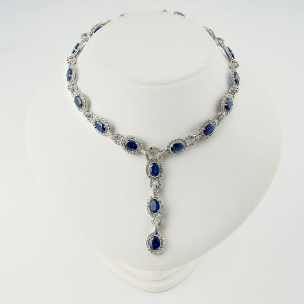 18k white gold necklace set with 12,15 CTW natural diamonds and 30 CTW blue sapphires