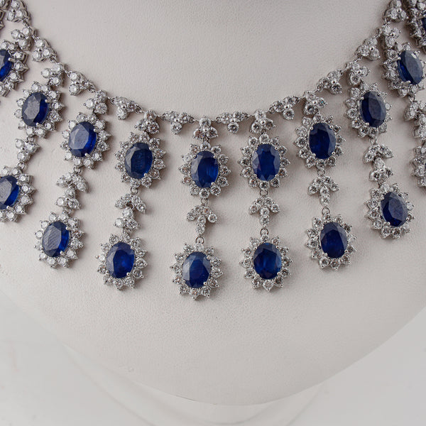 18k white gold drop necklace set with 24 ctw of natural diamonds & 37 ctw blue sapphires