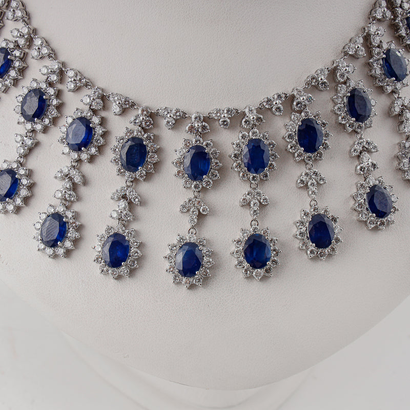 18k white gold drop necklace set with 24 ctw of natural diamonds & 37 ctw blue sapphires